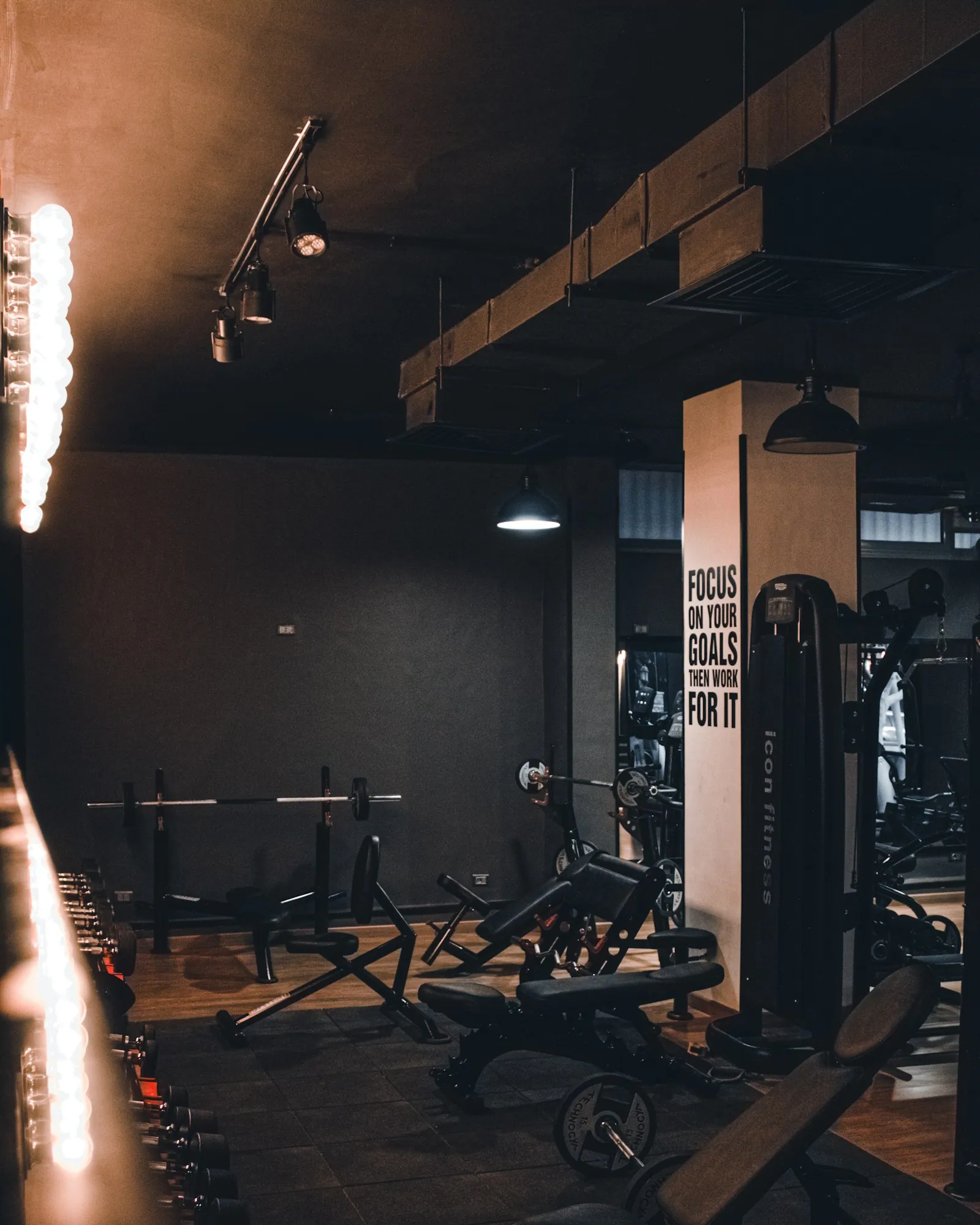 The Webbot training floor with rows of squat racks and lifting platforms